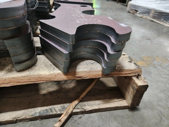 Heavy plate parts sitting on pallet